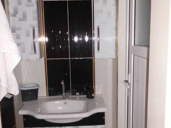 KİLİS ESKİ BEŞEVLER EKREMÇETİN BLOKLARINDA 2 BALKONLU  SATILIK DAİRE